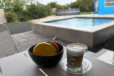 Image de Villa Anosia Tera: View with sunset, private pool, and 2 beaches nearby.