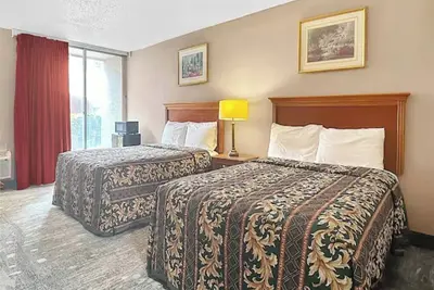 Image de 3 Affordable Rooms Near Graceland - Perfect for Family Adventure | Free Parking