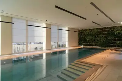 Image de Discover your exclusive corner in Milan: elegant apartment for 4 guests with double bedroom and bunk bed in the living area. The real plus? A large terrace that surrounds the whole house, perfect for moments of relaxation outdoors. There is a swimming po