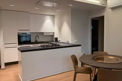 Image de 2-bedroom apartment in wonderful Colà with cool Ac, Garden and Pool