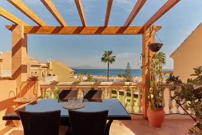 Image de Sunny penthouse Mar y Golf with sea views, terraces in peaceful Manilva