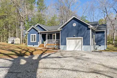 Image de Golf, Covered porch, Quiet Neighborhood, Fireplace, Firepit, Game room