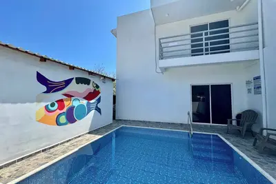 Image de 7-bedroom private hotel in Surf City with Ac + hot water