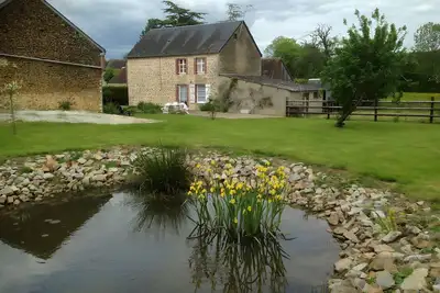 Image de Maison de campagne avec terrasse privée, jardin privé et Wi-Fi à Sainte-Scolasse-sur-Sarthe