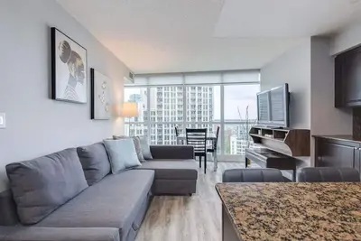 Cn Tower Views • 2br+Den Condo w/ Parking