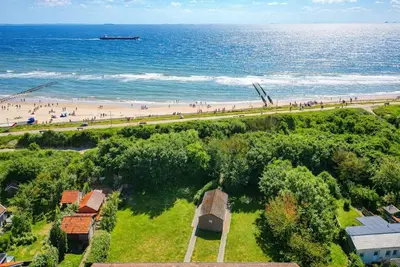 Image de Appartement de plage avec jardin et terrasse