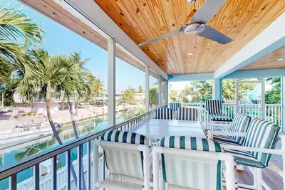 Image de Radiant waterfront retreat with remarkable views, patio, tennis court, & grill