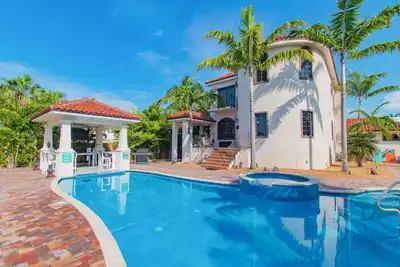 Image de Elegant waterfront home with private pools, hot tub, & dock - walk to beach