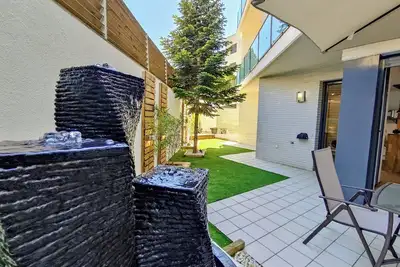 Image de Family Oasis in Fenals: Large Terrace 90m², Swimming Pool and Private Parking