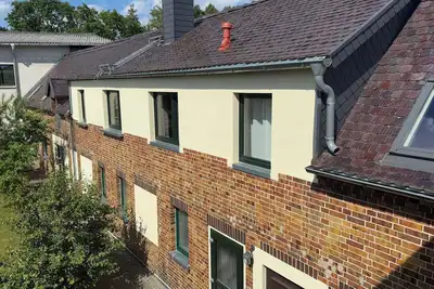 Image de Vacation apartment on the top floor in a spacious house with courtyard and garden