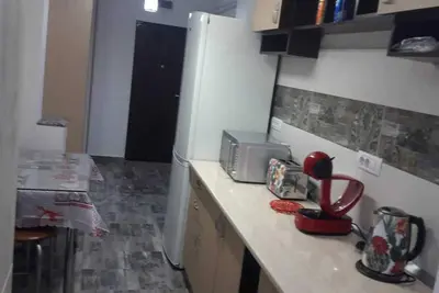 Image de une cuisine bien equipé, commerce en bas de l'immeubles, gare a 5 minute