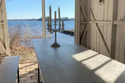 Image de Lake house with its own swimming area, guest cottage, sauna and orangery and boules court.