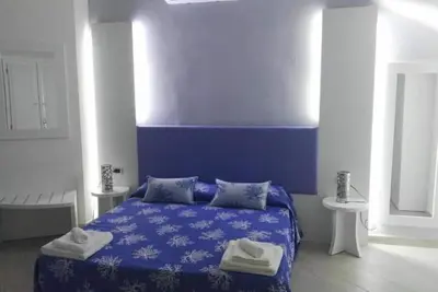 Image de Superior Quadruple Room with Sea View - Comfort and Relaxation in the Heart of Salento