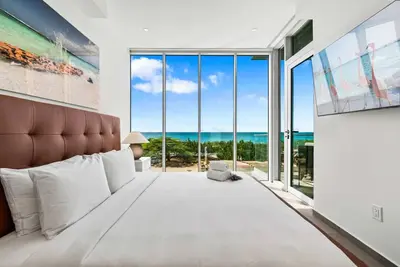 Image de 10 Sec to Eagle Beach | Rooftop Pool & Ocean View