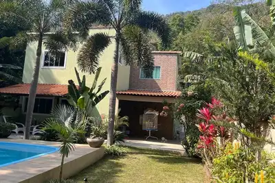 Image de A refuge in Guaratiba, nature, peace and rest. Private leisure and gourmet area.