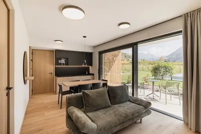 Image de Appartement Trianglhof « Rentsch » avec vue imprenable sur la montagne et jardin privé