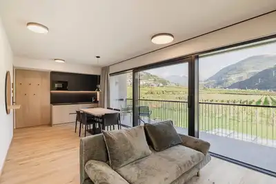 Image de Appartement Trianglhof 'Kampill' avec vue imprenable sur la montagne et grand balcon