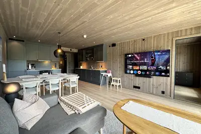Image de Slåttahølen - new and nice apartment with a central location in downtown Geilo.