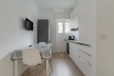 Image de GuestHost - Cozy 72m2 apartment, ideal for 4 people, located on the third floor of a building without a lift. The accommodation is located in the Forlanini district, a quiet residential area well equipped with the main services and well connected thanks t