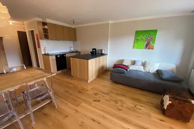 Image de Newly renovated vacation rental in Flims X Laax with a balcony, underground parking, indoor pool, and sauna