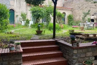 Image de Appartement cosy avec oasis privée et salle de jeux