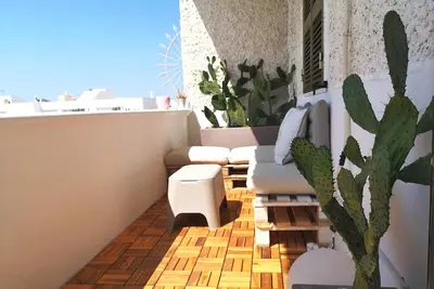 Image de Appartement « Il Porticciolo » avec vue sur la mer, Wi-Fi et climatisation