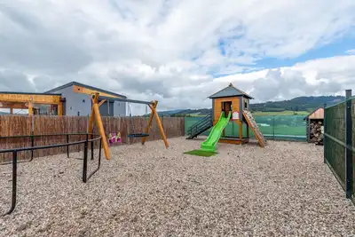 Image de Bel appartement dans une maison de vacances avec Wifi, bain à remous, climatisation, Tv, terrasse