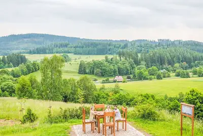 Image de Joli appartement dans une maison de vacances avec Wifi, climatisation, bain à remous, Tv, terrasse