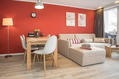 Image de A modern apartment with a balcony, stunning mountain views, and direct access to the slopes and local amenities.