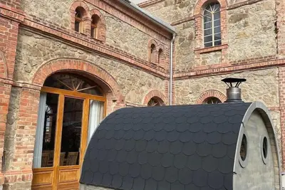 Image de Maisonettewohnung mit Kaminofen et Terrasse