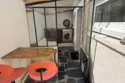Image de Logement Cosy à 10 minutes du port, terrasse avec barbecue et parking