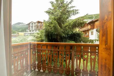 Image de Chalet « Appartement 1 » avec vue montagne, jardin commun et Wi-Fi