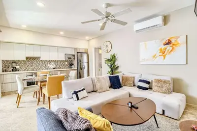 Tropical apartment with a balcony, modern interior, & W/D - rooftop pool access