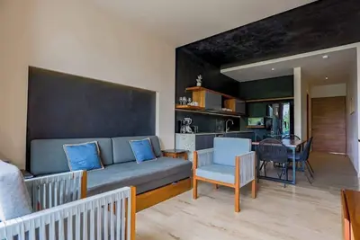 Modern apartment with rooftop pool, pool spa, lounge deck, & balcony