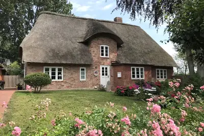 Image de WattGut vacation home in Oevenum: sauna, wood-burning stove & garden for 6 guests