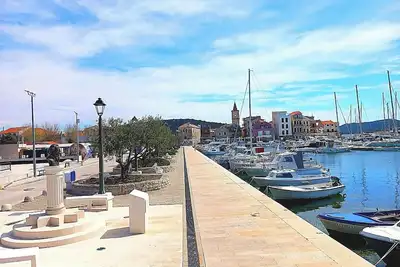 Image de Family apartment in Pirovac - 200 m to the beach (up to 7 people)