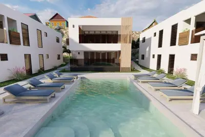 Image de Luxury apartment, including pool, 6 minutes from Mambo Beach.