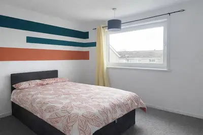 Image de Modern 3-bed home near airport with free parking.