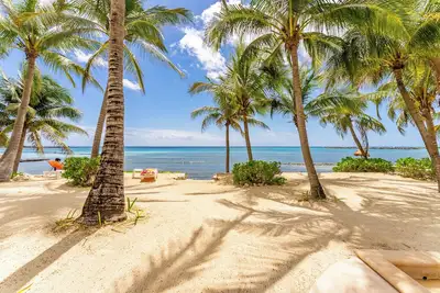 Image de Ocean Blue Beachfront Condo in Puerto Aventuras