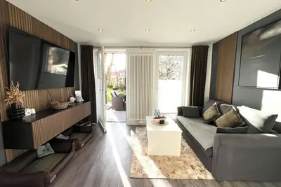 Image de Hafenglück - modern vacation apartment directly at the harbor in Carolinensiel