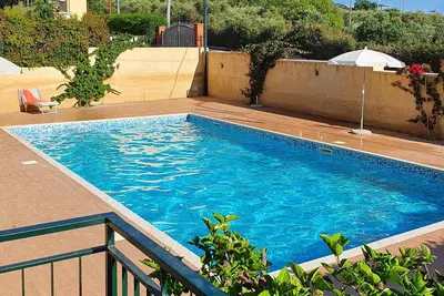 Image de Charmant appartement à Ricadi avec Wi-Fi