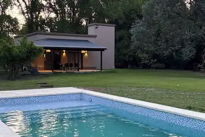 Image de Modern Country House in front of Araucaria Polo in Sdor Maria, Lobos with breakfast