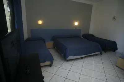 Image de Marina Living Rooms - Chambre Quadruple Confort avec piscine partagée, Wi-Fi et climatisation