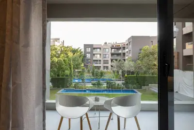 Image de 3-Bedroom Apart with Garden Views & Pool Access Gf