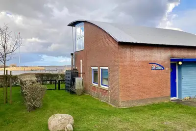 Image de Maison unique au bord du lac avec sauna et vue panoramique sur le port (5 personnes)