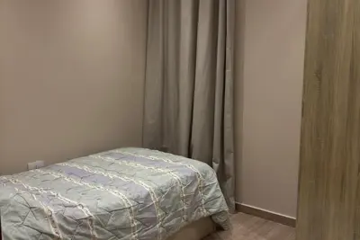 Spacious 3-bedroom apartment in tranquil Cairo with Ac