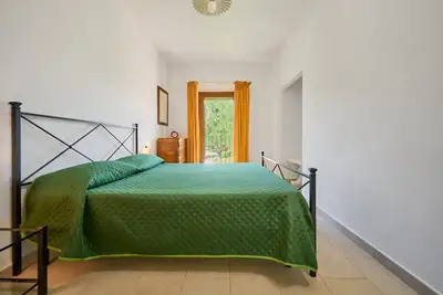 Image de Appartement « Le Sugherine - Aia » avec piscine partagée, Wi-Fi et climatisation
