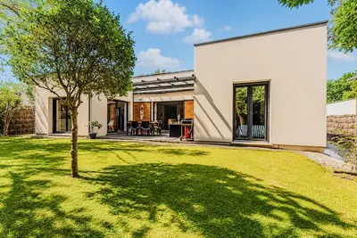 Image de Villa 'Le Rêve' à Mimizan Plage avec terrasse, jardin et climatisation