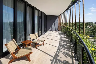 Image de Eco Lujo en Living the Noom Rooftop y Alberca