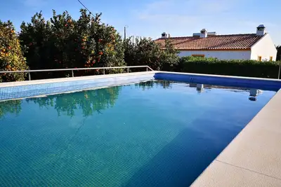 Image de House on a farm with an orange orchard